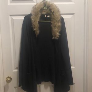 Ladies wool jacket with removable fur collar.